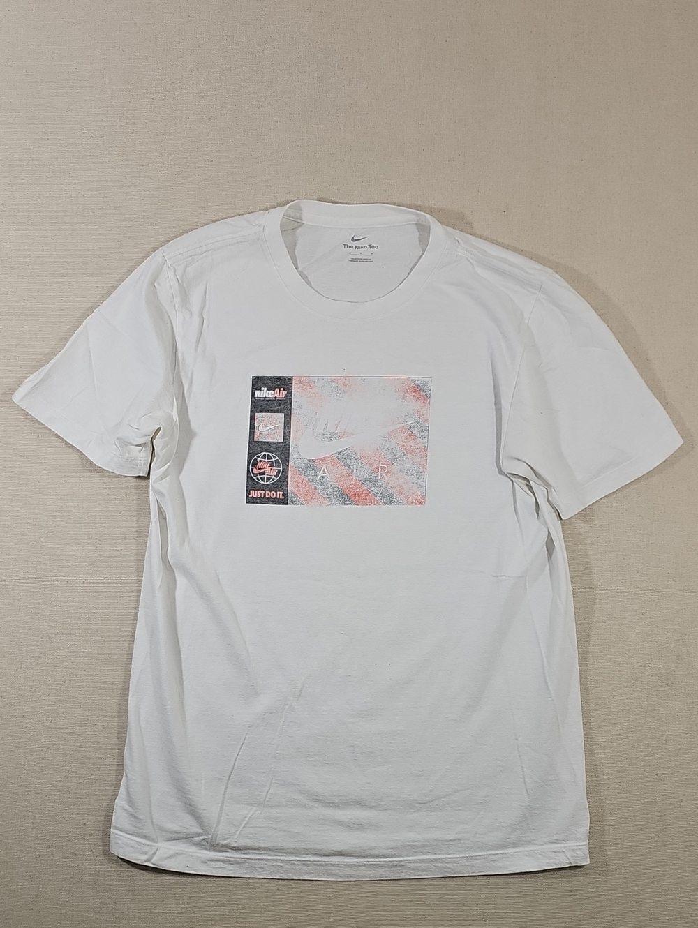 Nike White Short Sleeve Tee with Faded Multicolor Chest Graphic